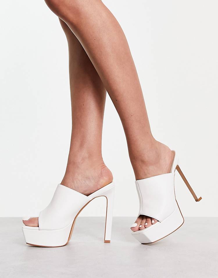 RAID Jovelyn platform heeled mules in white